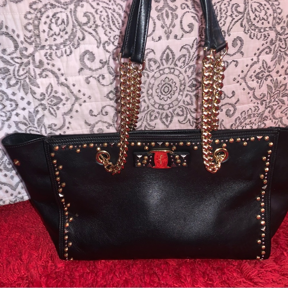 Salvatore Ferragamo black and gold handbag